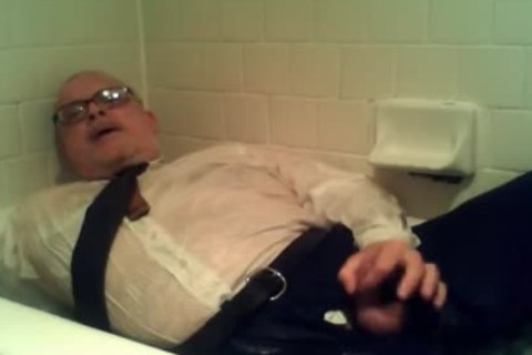 Pants Shirt And Tie And Sskanks  And Socks In Tub With cum