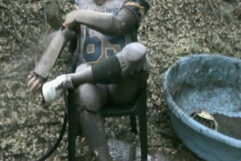 Getting wet & Muddy In My Football Uniform