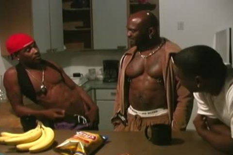 Three black men Sharing A pumped up man