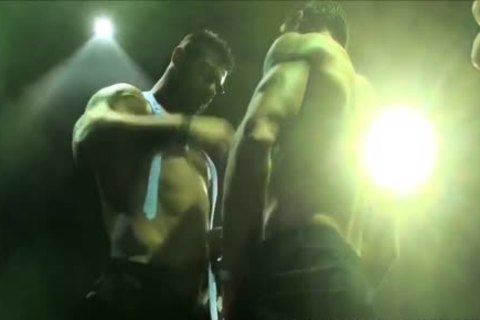 Suited guys Having Sex On Stage