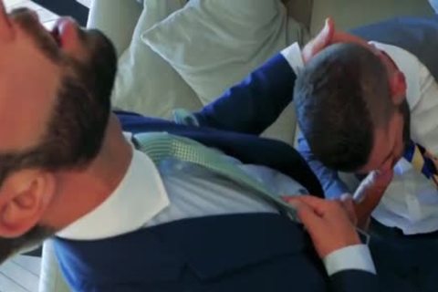 2 Suited fellows pounding